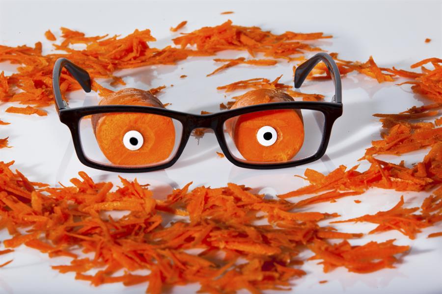 Carrots and peelings with eyeglasses.