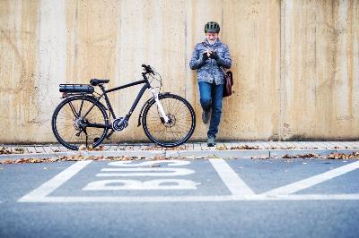 Older person with bike.