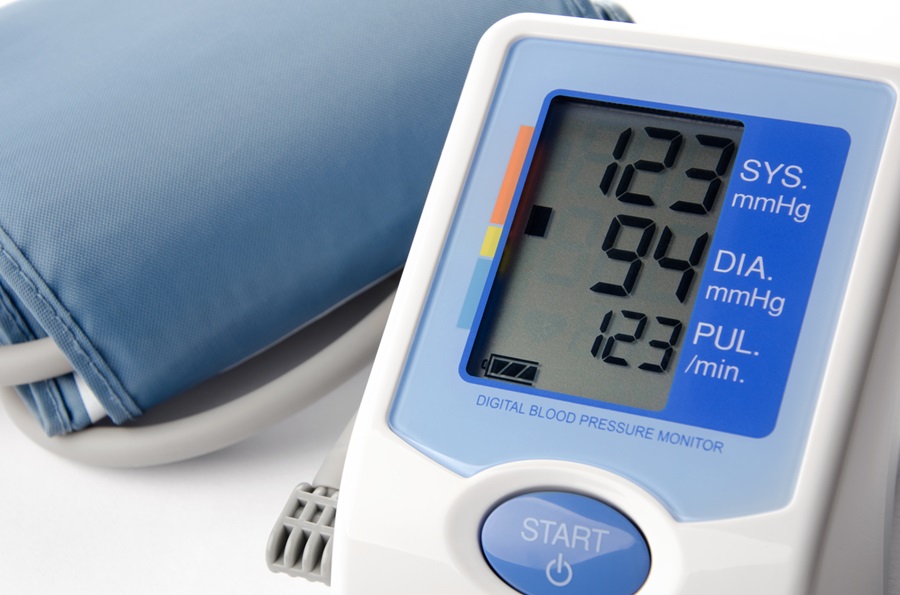 Digital Blood pressure monitor showing normal blood pressure reading