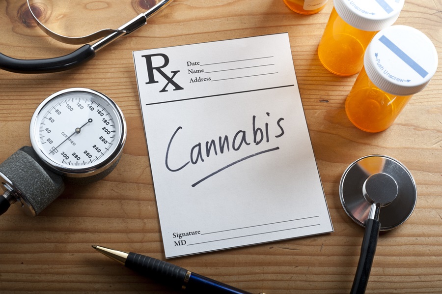 Paper prescription with cannabis written in the body